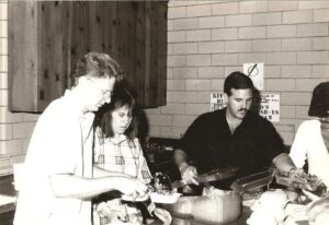 Volunteers prepare meals